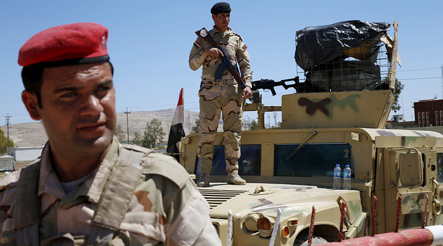 Fallujah civilians told to flee as Iraqi troops prepare to attack ISIS