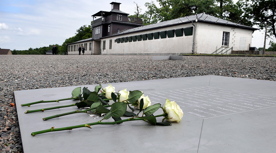 British fascists photographed giving Nazi salutes in Buchenwald camp ‘corpse cellar’