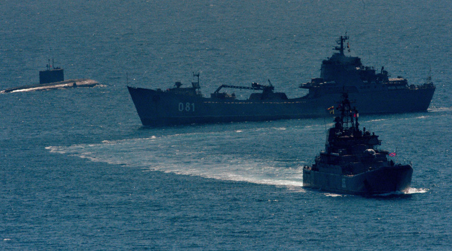 Large landing ships "Admiral Nevelskoi," foreground, "Nikolai Vilkov" and Varshavyanka-class diesel-electric submarine © Vitaliy Anko