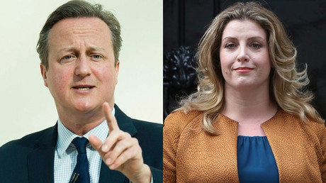 Britain's Prime Minister David Cameron and Penny Mordaunt © Reuters