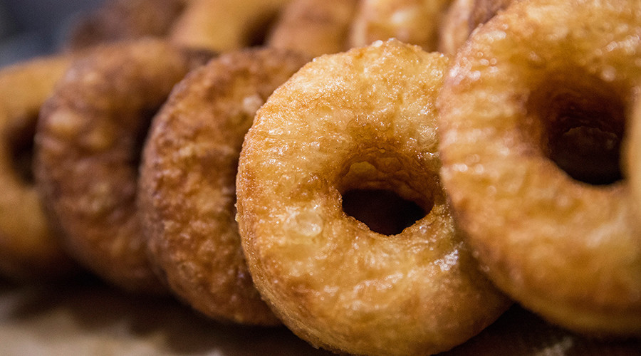 Cops hanging out in the doughnut shop say, ‘Way-oh, it’s National Donut Day!’