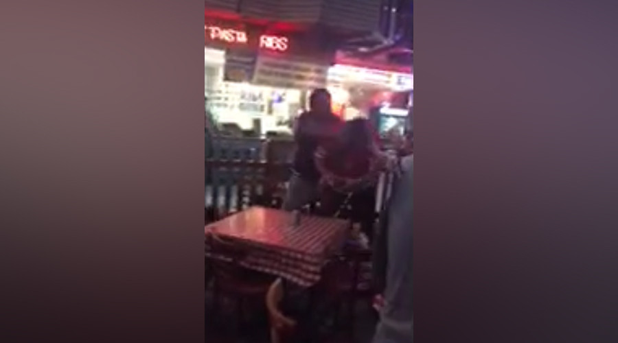 Newly released video shows off-duty cop punching restaurant patron in face