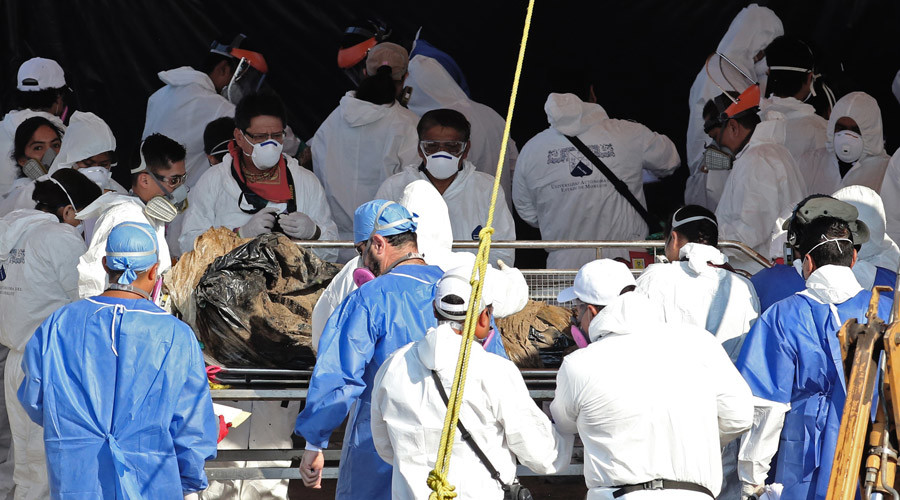 117 cadavers, including fetus & 2 children, exhumed from Mexican mass grave used by authorities