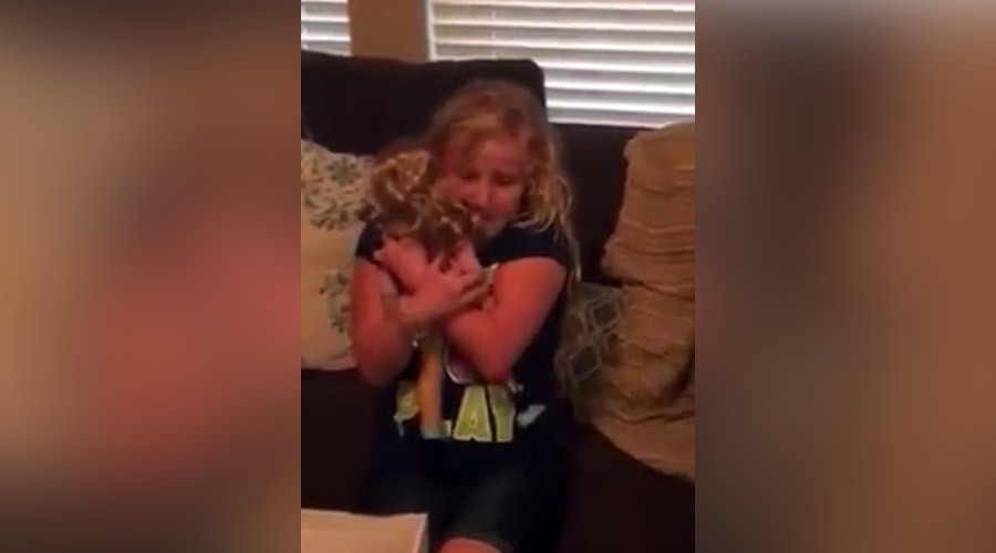 Young girl has tears of joy after receiving doll with prosthetic leg like hers (VIDEO)