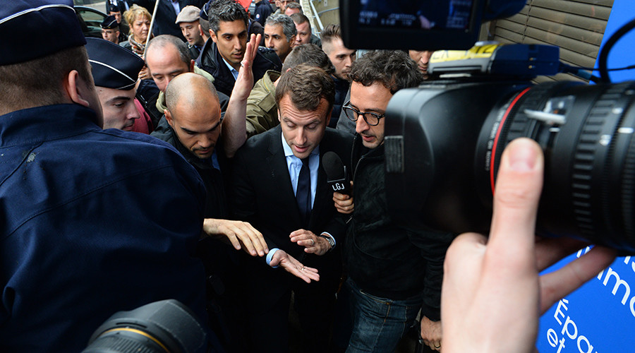 'Get lost!' French economy minister pelted with eggs amid labor reform strikes (VIDEO)