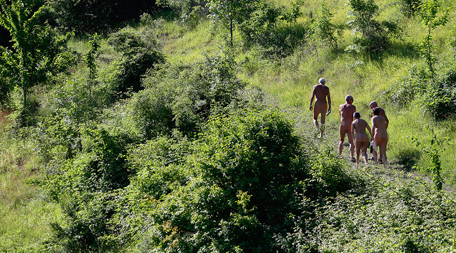 Naked & afraid: German nudist colony protests refugee shelter over safety concerns