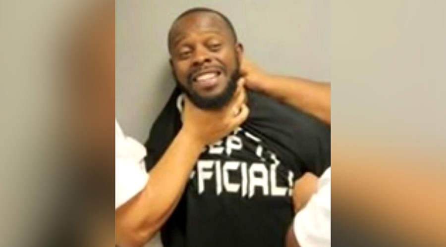 Million-dollar smile? Man sues sheriff’s dept. for choking him over grinning mug shot