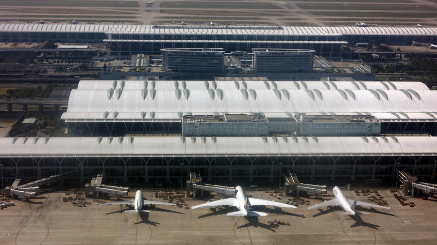 Shanghai airport blast: Suspect used improvised bomb, stabbed himself in neck