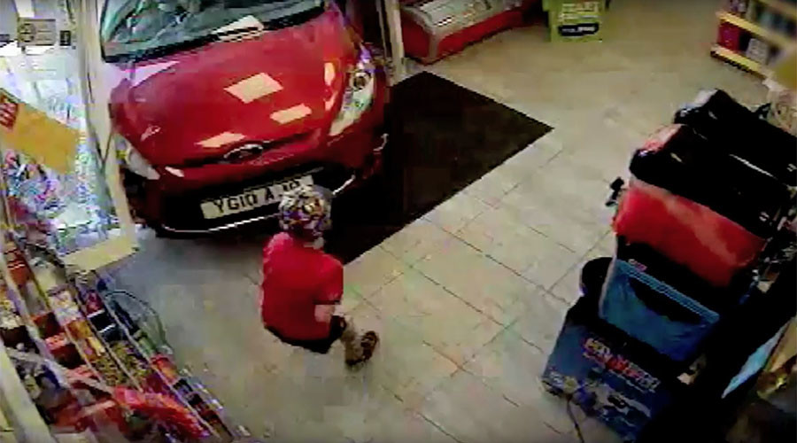 Reckless driver crashes through shop window, knocks down child (VIDEO)