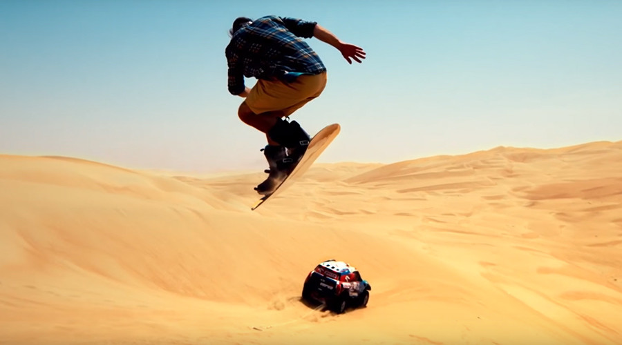 Dune shredder: Snowboarder tears up desert with Dakar rally speedster (VIDEO)