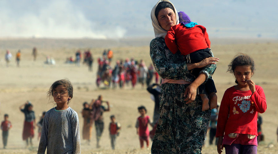 Displaced people from the minority Yazidi sect, fleeing violence from forces loyal to the Islamic State in Sinjar town © Rodi Said