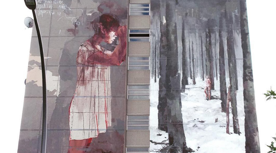 Berlin residents angered by mural showing bloody refugee, arrow-pierced body