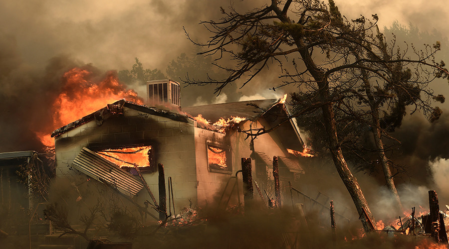'Firefight of epic proportions': California wildfire kills 2, forcing thousands to flee homes