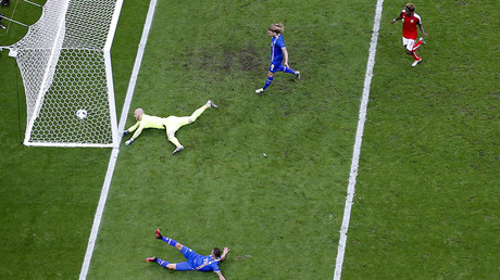 Austria's goalkeeper Robert Almer fails to save a goal by Iceland's Arnor Ingvi Traustason. © Darren Staples