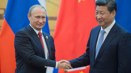 Russian President Vladimir Putin and Chinese President Xi Jinping. © Sergey Guneev