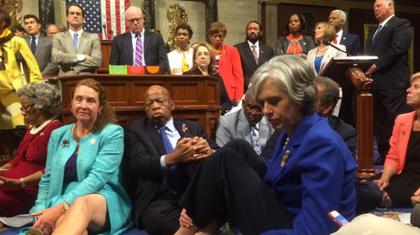 Democratic members of the House staging a sit-in on the House floor 