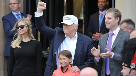 Republican presidential candidate Donald Trump, his son Eric (R) and his daughter Ivanka (L) pose for photographs as they arrive at his Turnberry golf course, in Turnberry, Scotland, Britain June 24, 2016 © Clodagh Kilcoyne