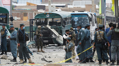 Afghan security forces inspect the damage caused by a suicide bombers at the site of the attackon the western outskirts of Kabul, Afghanistan June 30, 2016 © Omar Sobhani 