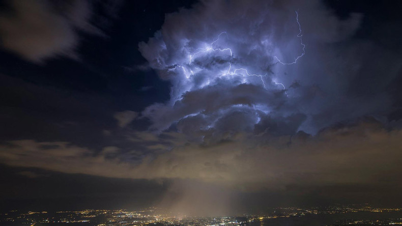 Spooky clouds over CERN spark 'portal to other dimensions’ theory — RT ...