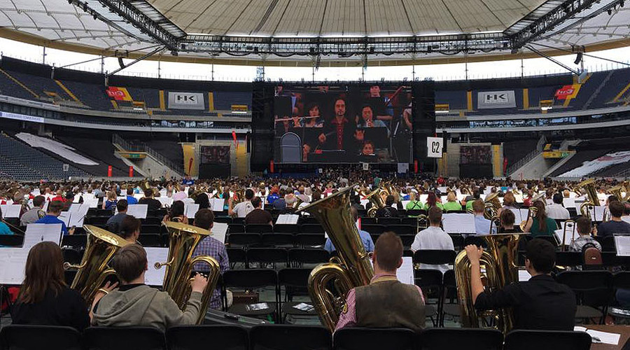Mass orchestra snares world record with 7,500 instrument performance (VIDEO)