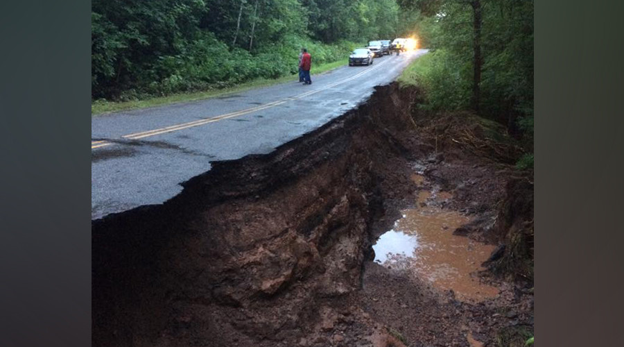 Wisconsin tornado warning issued as floodwater washes away harbor, chunks of road (PHOTOS)
