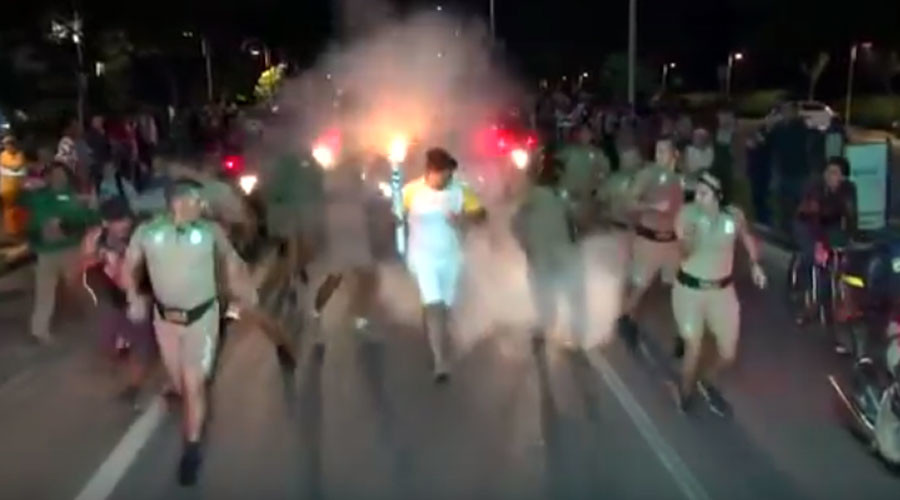 Olympic torch bearer attacked by man with fire extinguisher (VIDEO)