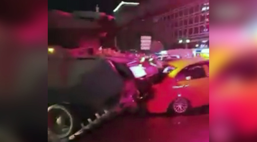 Tanks run over cars in Istanbul as protesters climb onto, block them (VIDEOS)
