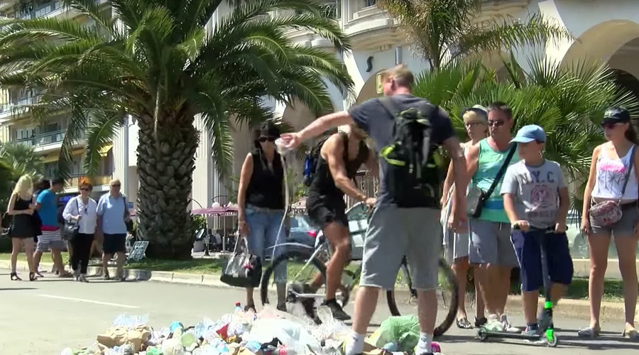 A heap of hate: People spit, throw garbage onto spot where Nice attacker was shot (VIDEOS, PHOTOS)
