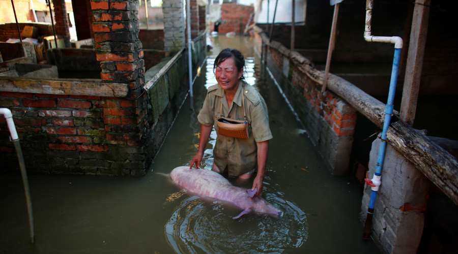 154 killed, 8.6 million affected as extreme rains flood China (PHOTOS)