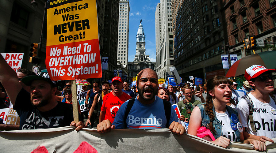 Sanders delegates boo Clinton mentions as DNC seeks to show unified party