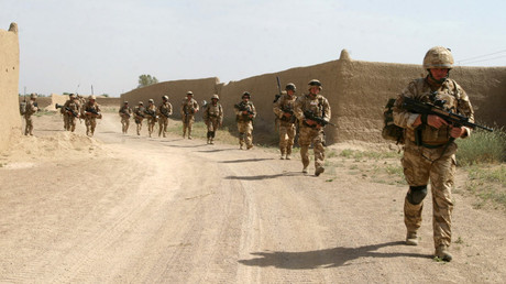 British soldiers from The Black Watch, 3rd Batallion, Royal Regiment of Scotland patrol during an operation in Gereshk District, Helmand province © Jonathon Burch 