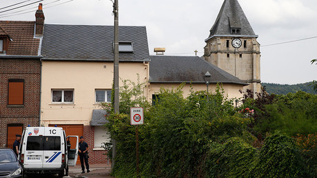 French CRS police secure a street near the church after a hostage-taking in Saint-Etienne-du-Rouvray near Rouen in Normandy, France, July 26, 2016 © Pascal Rossignol