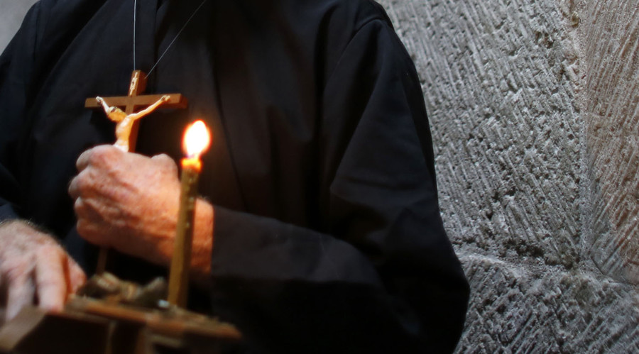 'Asylum seeker' stabs Belgian priest who let him in to shower, but refused to give cash