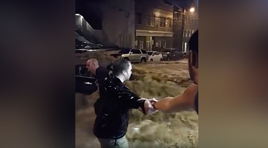 Human chain saves woman from flooded car in Maryland (VIDEO)