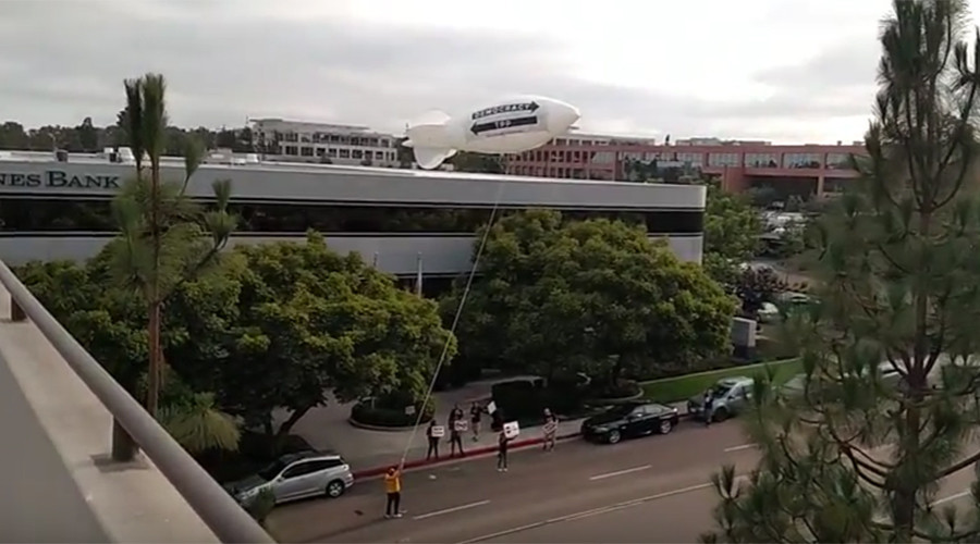 Airborne ‘anti-TPP’ protest blimp floats above congressional office