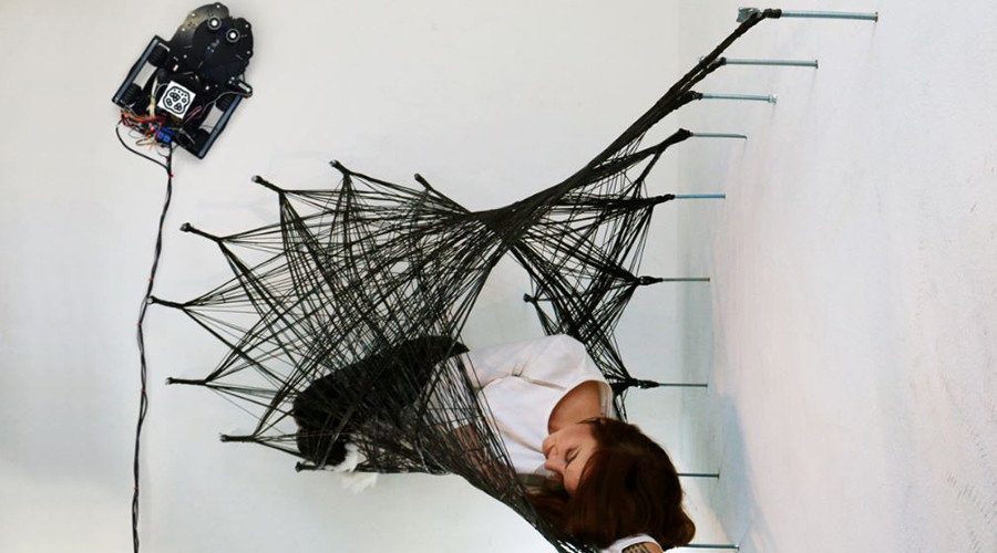 Incredible ceiling-crawler robots weave human wall ‘cocoon’ (VIDEO)