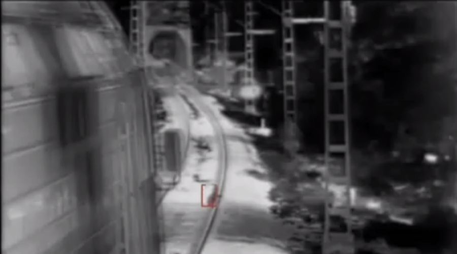 CCTV catches race to save child's life as cargo train hits brakes (VIDEO)