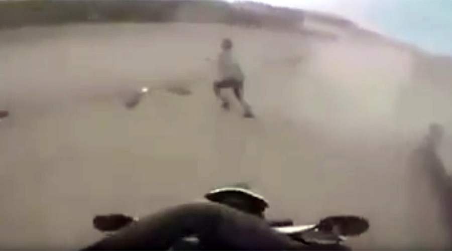 Helmet-cam: Motor-cop rides ON TO fleeing suspect, nails it (VIDEO)