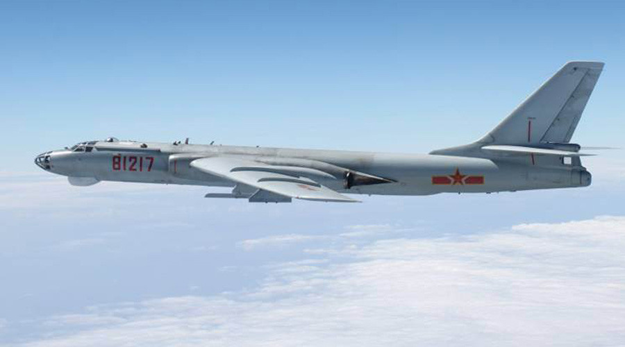 Beijing sends bombers, fighter jets on combat patrols over contested S. China Sea 57a5d84ac361885c5b8b458f
