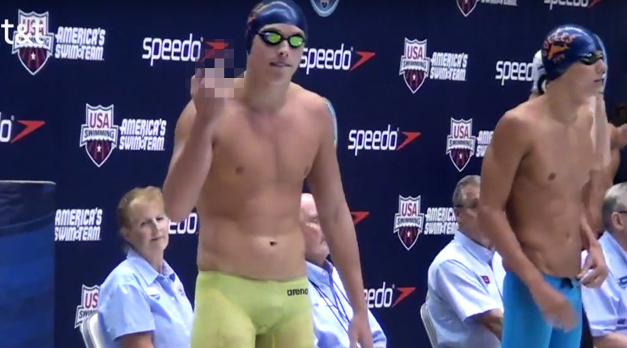 Canadian swimmer flips his father the middle finger before every race