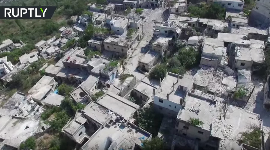 Drone VIDEO shows ruins of Kinsabba town after Syrian army liberates town
