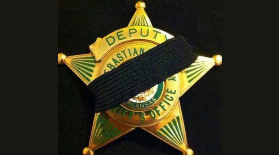 Ambush on Arkansas police officers leaves one dead and K-9 missing