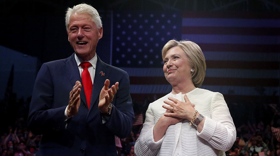 Clinton’s tax returns show income hit, dubious donations