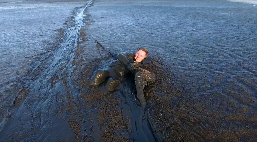Drone camera captures photographer's risky race to reach drowning eagle (VIDEO)