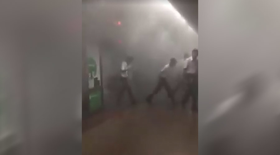 Plumes of smoke at Singapore underground train station, commuters rushing out (PHOTOS, VIDEOS)