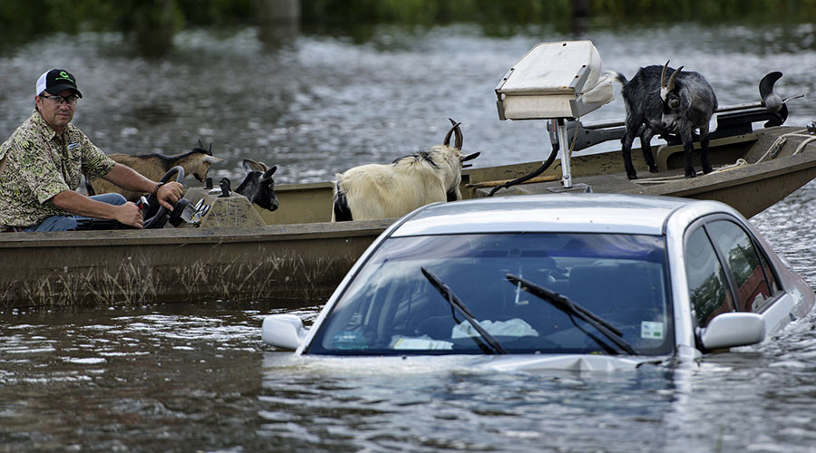 As death toll climbs in Louisiana flooding, Obama officials urge no race, color discrimination