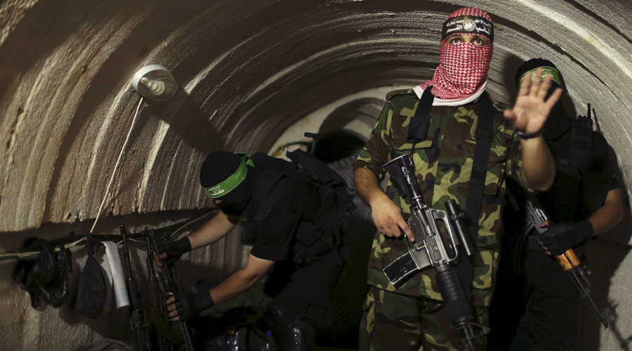 A Palestinian fighter from the Izz el-Deen al-Qassam Brigades, the armed wing of the Hamas movement. © Mohammed Salem
