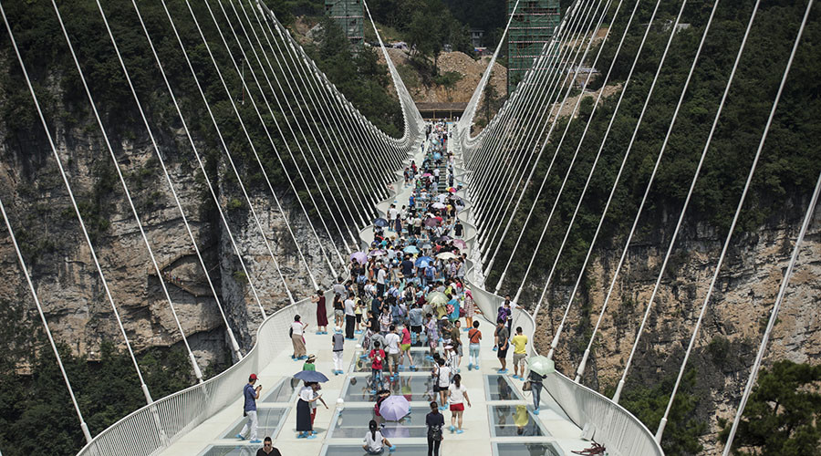 Do look down: China unveils world’s longest & highest glass bridge (VIDEO)