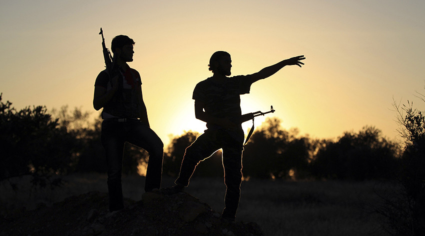 Turkey-backed militants set to race US-supported Kurds for ISIS-held Syrian town