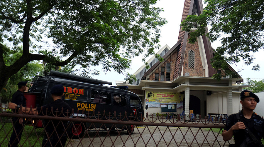 Police are seen outside Saint Joseph catholic church after a suspected terror attack by a knife-wielding assailant on a priest during the Sunday service in Medan, North Sumatra, Indonesia August 28, 2016 in this photo taken by Antara Foto © Irsan Mulyadi